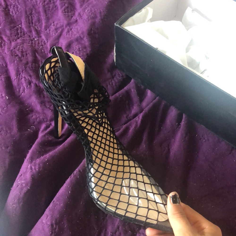 Black fishnet pouted toe heels
